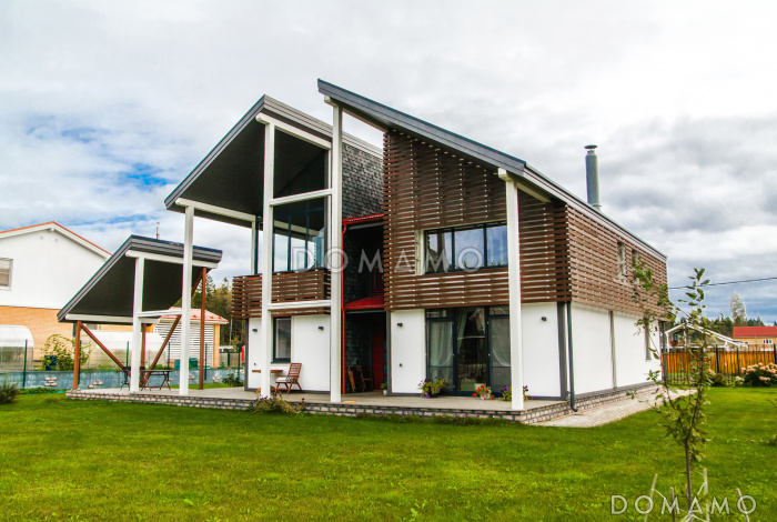 Проект каркасного современного дома с изолированной кухней