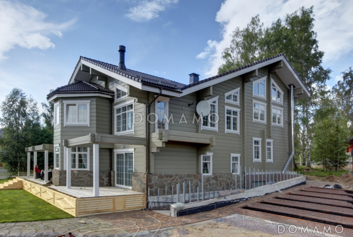 Проект огромного дома из клееного бруса общей площадью более 600 м2