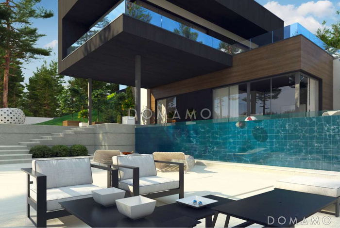 Проект современного двухэтажного дома из кирпича с плоской крышей необычного дизайна, подходит для участка со склоном