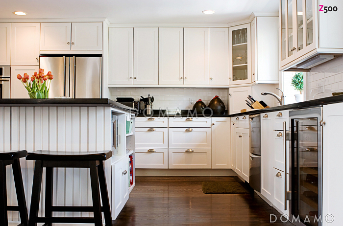 Проект одноэтажного мансардного дома из газобетона с прямоугольным выступом на втором уровне