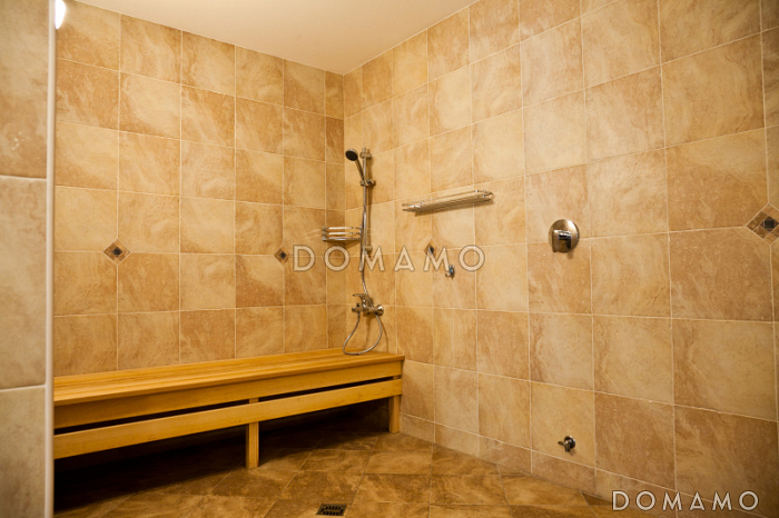 Проект каркасного дома с местом для трех авто