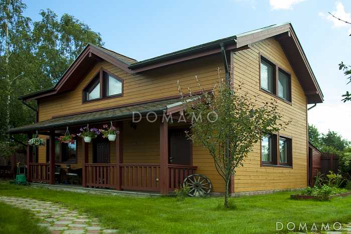 Проект бани из газобетонных блоков с угловой крытой террасой, сараем и мансардным этажом