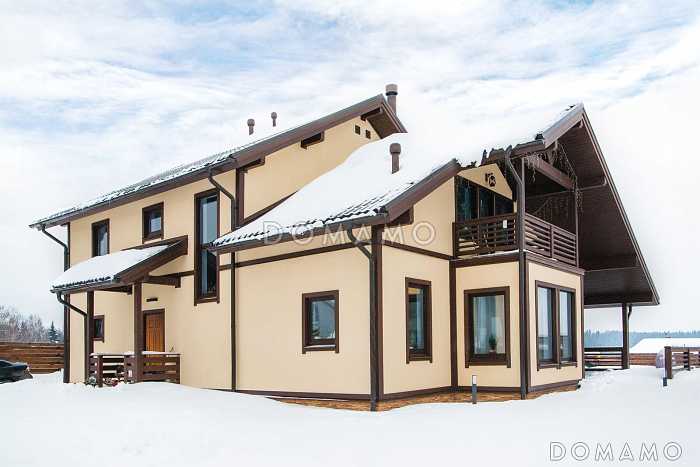 Проект мансардного дома из газобетона с 4 спальнями, кабинетом, сауной и крытой террасой