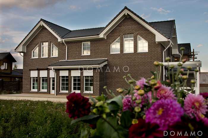 Проект каркасного дома с навесом и гаражом