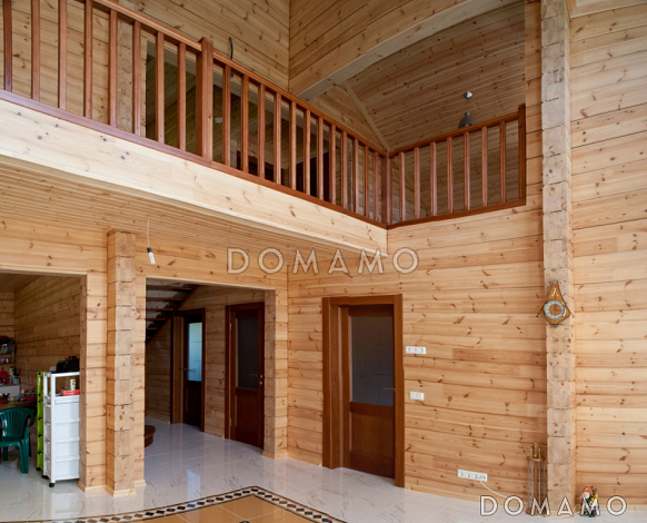 Проект деревянного дома из клееного бруса с просторной прихожей