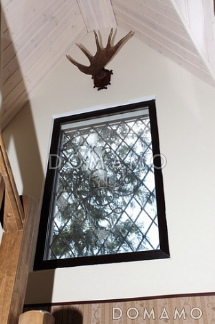 Проект дома из пеноблоков в стиле фахверк с сауной на мансардном этаже