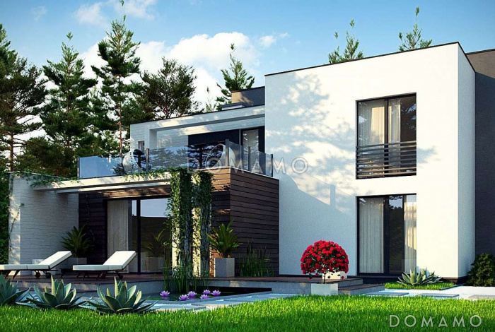 Проект красивого двухэтажного коттеджа из газобетона с террасами на втором уровне