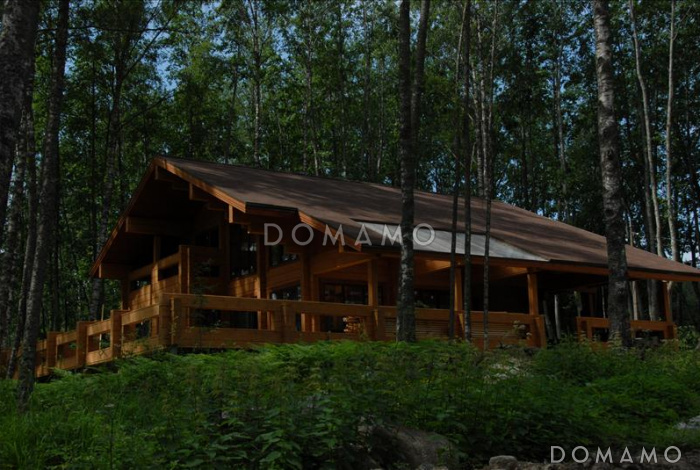 Проект дома из клееного бруса с красивыми крытыми террасами