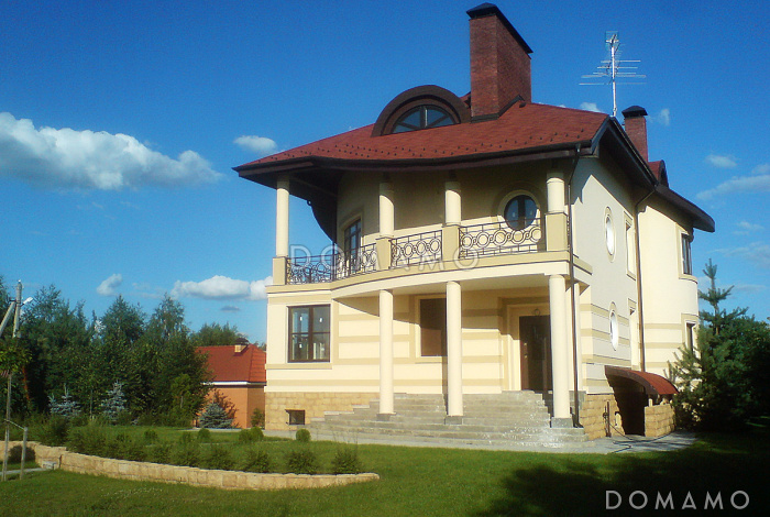 Проект современного дома с мансардным и цокольным этажом