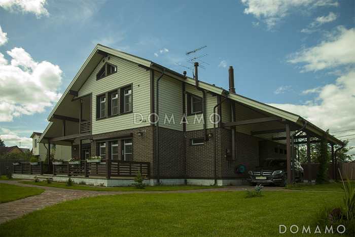 Проект дома из газобетонных блоков с отделкой из двух материалов